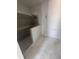 Unfinished bathroom featuring a shower and ready for customization at 4208 W Carmen St # C, Tampa, FL 33609