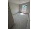 An unfinished bedroom ready for customization with bright sunlight through windows at 4208 W Carmen St # C, Tampa, FL 33609