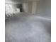 Spacious living room with large windows providing natural light and ample space at 4208 W Carmen St # C, Tampa, FL 33609