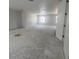 Unfinished living room offering plenty of space and natural light at 4208 W Carmen St # C, Tampa, FL 33609