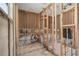 Bathroom under construction with exposed framing, plumbing, and unfinished flooring at 4221 Burrows Rd, Zephyrhills, FL 33542