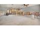 A glimpse into the home's layout showcasing large living room under construction at 4221 Burrows Rd, Zephyrhills, FL 33542