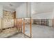 Unfinished living room showing exposed walls and flooring at 4221 Burrows Rd, Zephyrhills, FL 33542