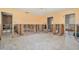 Open layout living room featuring exposed framing at 4221 Burrows Rd, Zephyrhills, FL 33542