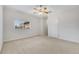 Bedroom boasting neutral carpet, and a window that brings in tons of natural light at 4641 John Moore Rd, Brandon, FL 33511