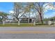 Elegant home featuring a well manicured front yard and an iron perimeter fence at 4641 John Moore Rd, Brandon, FL 33511
