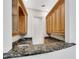 Wet bar with wooden cabinets, granite countertops, sink and gold faucet at 4641 John Moore Rd, Brandon, FL 33511
