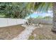 Backyard featuring a fire pit with chairs at 4726 W Fairview Hts, Tampa, FL 33616