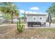 Backyard featuring a patio with outdoor seating at 4726 W Fairview Hts, Tampa, FL 33616