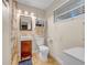 Cozy bathroom with a walk-in shower and tiled flooring at 4726 W Fairview Hts, Tampa, FL 33616