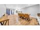 Open dining room boasts wood floors and seamlessly connects to kitchen at 4726 W Fairview Hts, Tampa, FL 33616