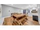 Open dining room with table, chairs, and view of the kitchen at 4726 W Fairview Hts, Tampa, FL 33616
