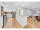 Beautiful kitchen with island, stainless appliances, granite countertops, and ample storage at 4726 W Fairview Hts, Tampa, FL 33616