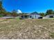 Picture perfect house with a big open backyard and a screened in porch to complete the home at 502 Chilt Dr, Brandon, FL 33510