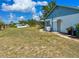 Home featuring a spacious yard, a covered patio, and efficient air conditioning system at 502 Chilt Dr, Brandon, FL 33510
