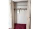 Bedroom closet with white walls, red carpet, and wire shelving at 502 Chilt Dr, Brandon, FL 33510