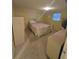 Cozy bedroom with carpeted floor, windows, and bright lighting at 5031 Billings Dr, Holiday, FL 34690