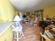 Inviting living room features hardwood floors, natural light and cozy furnishings at 5031 Billings Dr, Holiday, FL 34690