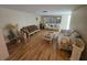 Bright living room featuring hardwood floors and large windows at 5031 Billings Dr, Holiday, FL 34690