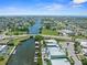 Scenic aerial shot of waterfront homes, lush landscaping, and intersecting canals, highlighting the area's boating lifestyle at 574 Bimini Bay Blvd, Apollo Beach, FL 33572