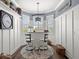 Stylish bar area with seating and windows offering natural light and providing a perfect space to relax at 574 Bimini Bay Blvd, Apollo Beach, FL 33572