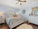 Bedroom with white furniture, ceiling fan, and natural light at 574 Bimini Bay Blvd, Apollo Beach, FL 33572