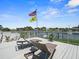 The top floor sun deck includes lounge chairs and views of the water and surrounding neighborhood at 574 Bimini Bay Blvd, Apollo Beach, FL 33572