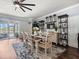 Dining room with table, ceiling fan, and view to backyard at 574 Bimini Bay Blvd, Apollo Beach, FL 33572