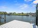 Waterfront view from the dock with a ladder to the canal at 574 Bimini Bay Blvd, Apollo Beach, FL 33572