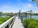This dock includes a boat lift, a fish cleaning station, and easy access to waterfront activities at 574 Bimini Bay Blvd, Apollo Beach, FL 33572