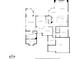 Detailed first floor plan showing layout of primary bedroom, living spaces, kitchen, and garage at 6127 Cezanne Ave, Lutz, FL 33558