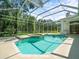 Beautiful, screened-in pool and spa with abundant backyard views at 6127 Cezanne Ave, Lutz, FL 33558