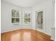 Bright sun room with wood floors and views of the pool at 6127 Cezanne Ave, Lutz, FL 33558