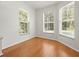 Sun room with multiple windows overlooking the backyard at 6127 Cezanne Ave, Lutz, FL 33558