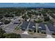 Elevated view of neighborhood townhouses with landscaping, near a bay and commercial areas at 6619 S Manhattan Ave # 1, Tampa, FL 33616