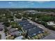 Aerial view showcases Camellia Square townhomes with lush landscaping and easy access to local amenities at 6619 S Manhattan Ave # 1, Tampa, FL 33616
