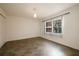 This bedroom has neutral walls, tile flooring, and bright windows offering natural light at 6960 20Th N Ave # 203B, St Petersburg, FL 33710