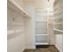 Walk-in closet featuring multiple shelves and closet rod for organization at 6960 20Th N Ave # 203B, St Petersburg, FL 33710