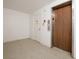 Interior view featuring an elevator and doors with a speckled floor at 6960 20Th N Ave # 203B, St Petersburg, FL 33710