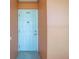 Unit 203B featuring a standard front door with security features at 6960 20Th N Ave # 203B, St Petersburg, FL 33710