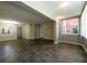 Spacious living room showcasing large windows and modern flooring at 6960 20Th N Ave # 203B, St Petersburg, FL 33710