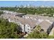 An aerial view showing the multi-story condo building and city skyline at 800 S Dakota Ave # 337, Tampa, FL 33606