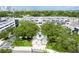 An aerial view showcases lush trees and a central fountain feature surrounded by residential buildings at 800 S Dakota Ave # 337, Tampa, FL 33606