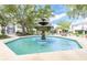 A tiered fountain creates a serene community gathering place in a scenic park setting at 800 S Dakota Ave # 337, Tampa, FL 33606