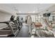 Bright gym featuring modern cardio equipment, weight machines, and mounted TVs at 800 S Dakota Ave # 337, Tampa, FL 33606