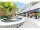 Charming outdoor shopping area with a fountain, awnings, and potted plants at 800 S Dakota Ave # 337, Tampa, FL 33606