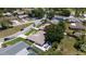 An aerial view showcases the property's landscaping and neighborhood setting at 8060 Canterbury Cir, Seminole, FL 33777
