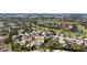 An aerial view captures the home's location amidst a golf course community at 8060 Canterbury Cir, Seminole, FL 33777