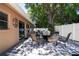 Enjoyable back patio with seating and hot tub in the backyard at 8060 Canterbury Cir, Seminole, FL 33777
