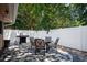 Outdoor living on the back patio with seating and BBQ grill, perfect for entertaining at 8060 Canterbury Cir, Seminole, FL 33777